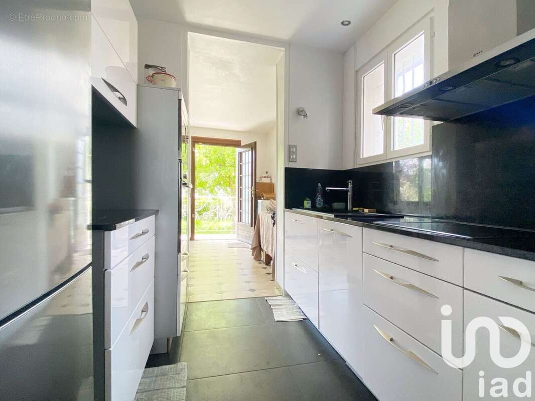 Photo 8 - Maison à VILLEMOMBLE