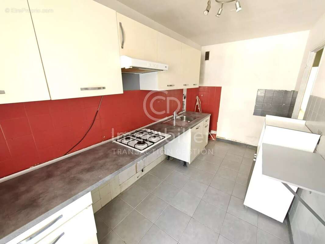 T3 traversant sud-nord 62m² rez-de-jardin - photo 6