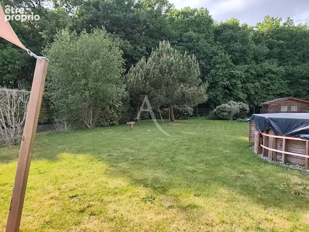Maison familiale de 101  m² avec jardin et verdure - photo 14