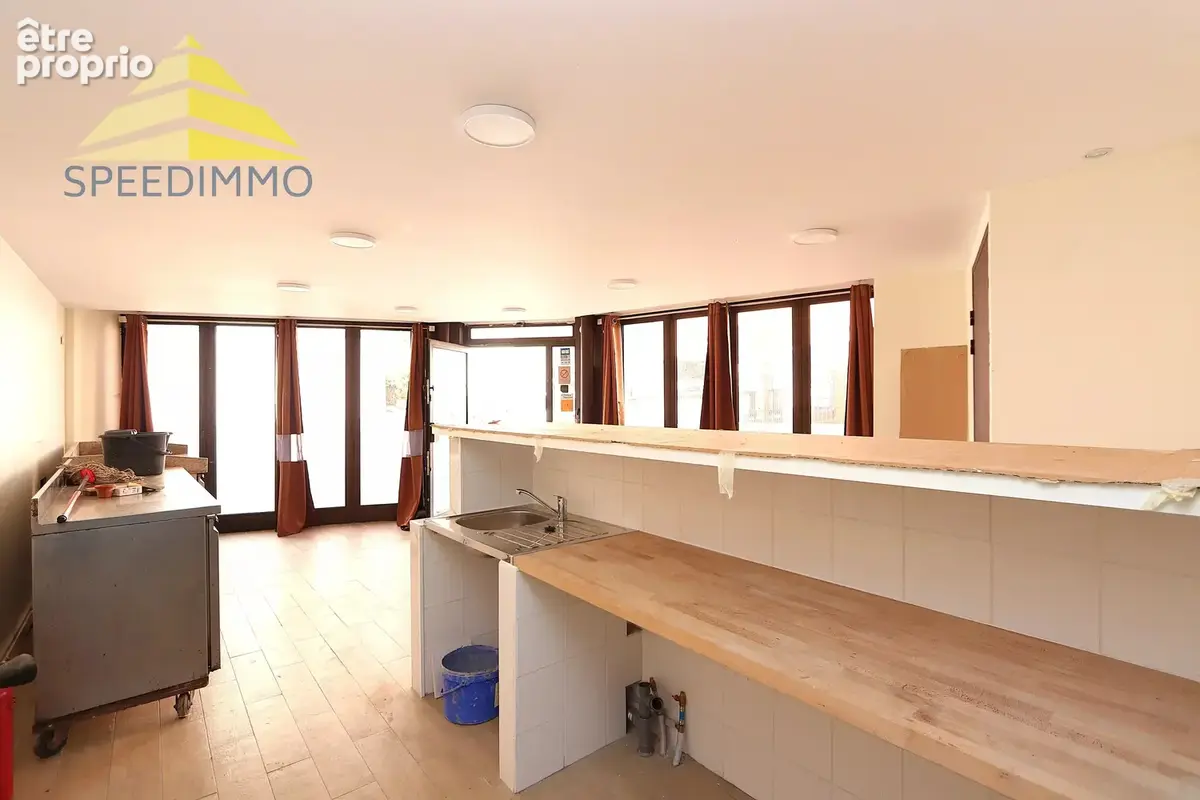 Immeuble de rapport – commerce + 3 appartements - photo 2
