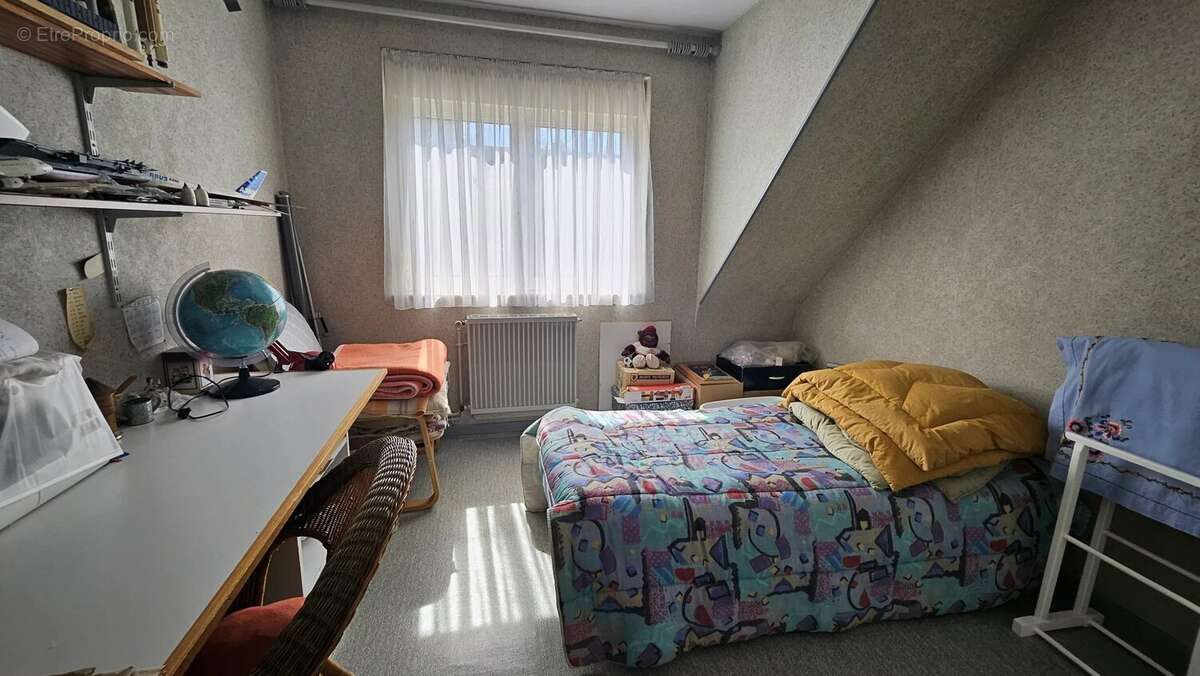 Maison 100 m² à Neuville-En-Ferrain  - photo 9