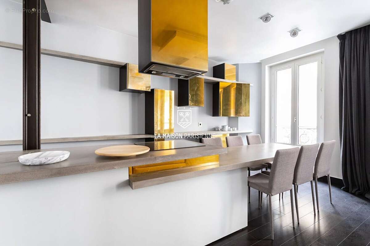 Appartement Paris 2 pièce(s) 62 m2 - photo 4