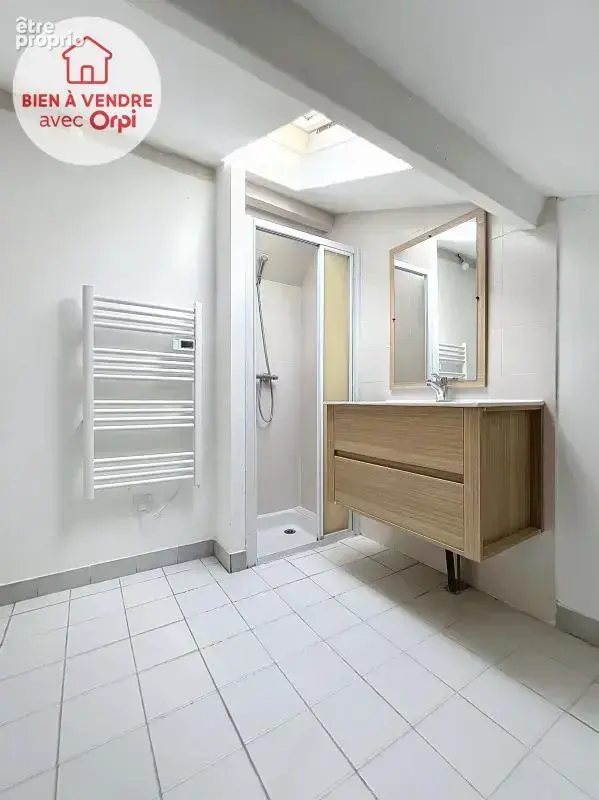 Appartement  loué F1 (22 m² Carrez) à vendre à JUZIERS - photo 4