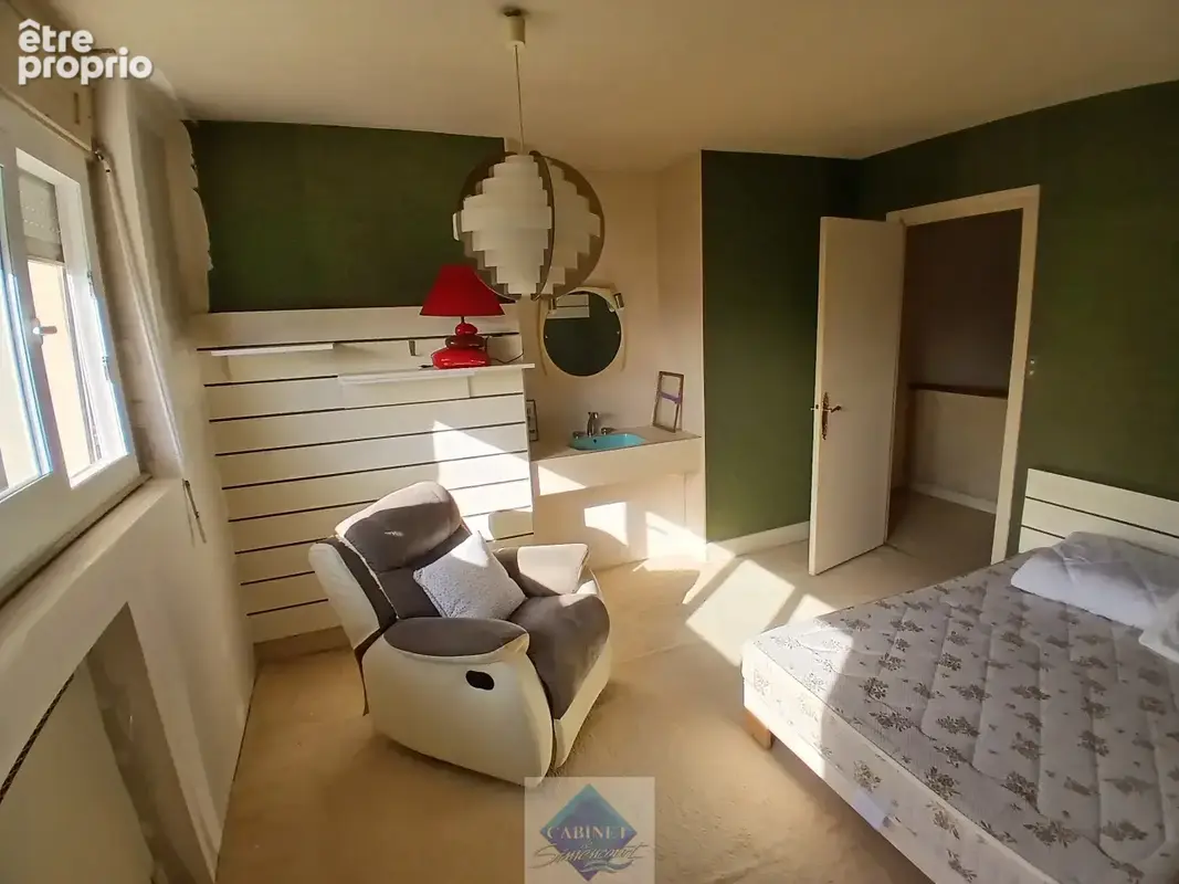 Maison familiale de 127 m2 sur un terrain arboré de 980 m2 - photo 8