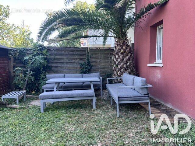 Photo 1 - Appartement à PAREMPUYRE