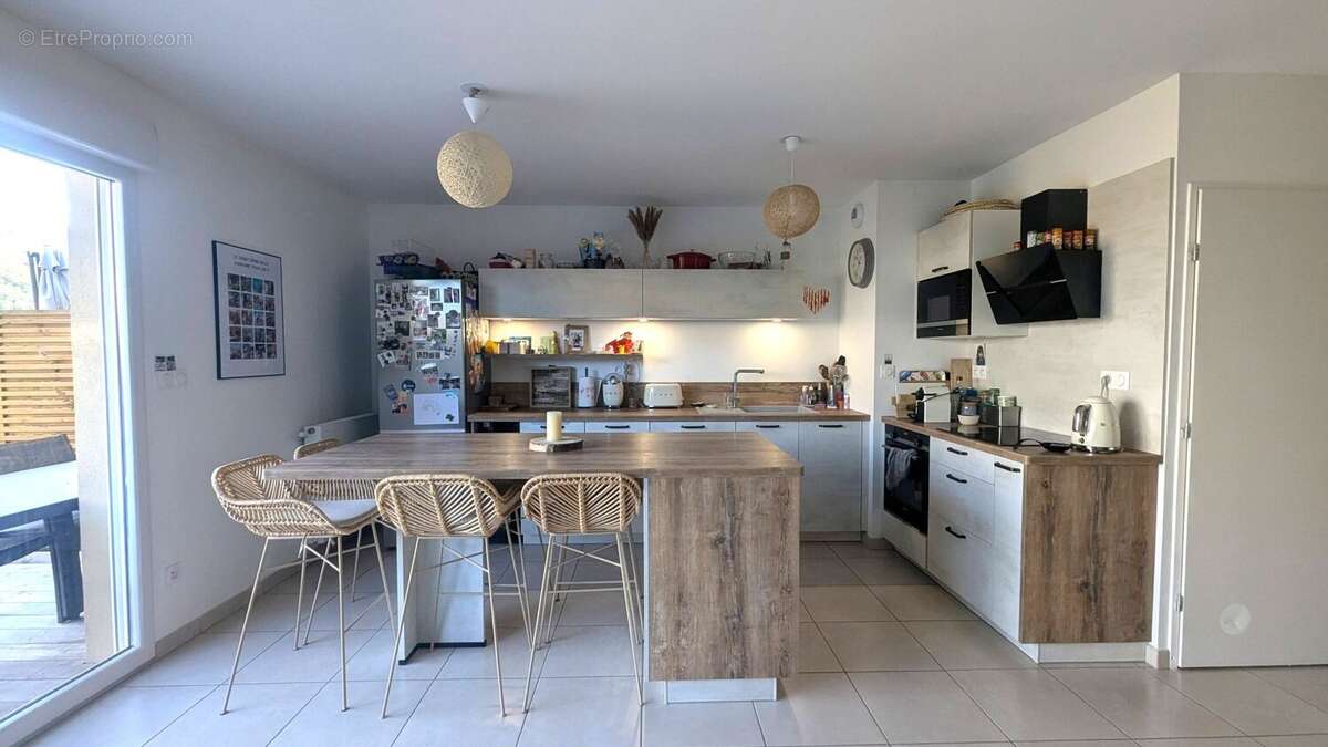 Maison 87 m² à Saint-Etienne-De-Crossey  - photo 4