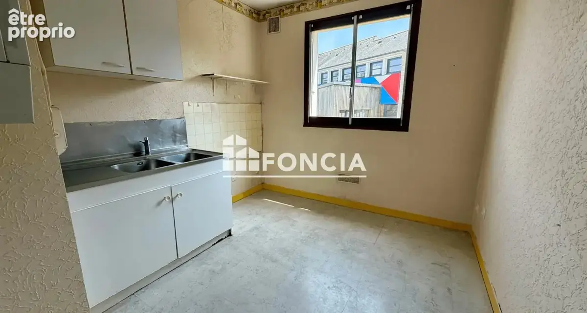 Centre-ville, Appartement T3 de 63 m² avec balcon, cave et parking privatif - photo 2