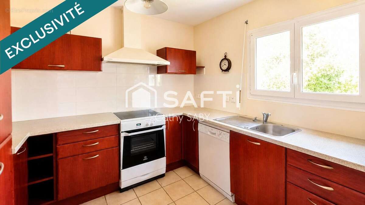 Maison 95 m² à Cransac  - photo 4