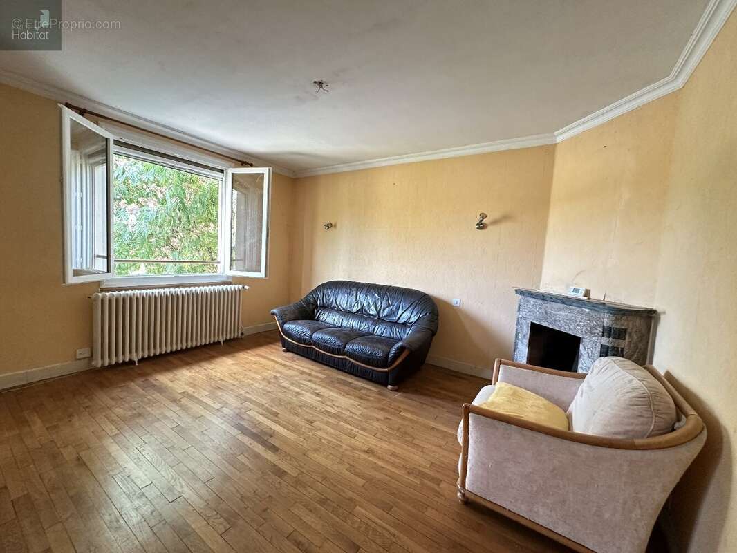 Proche du centre ville, quartier calme, Maison 4 chambres, garage, sur terrain de 630m² - photo 2