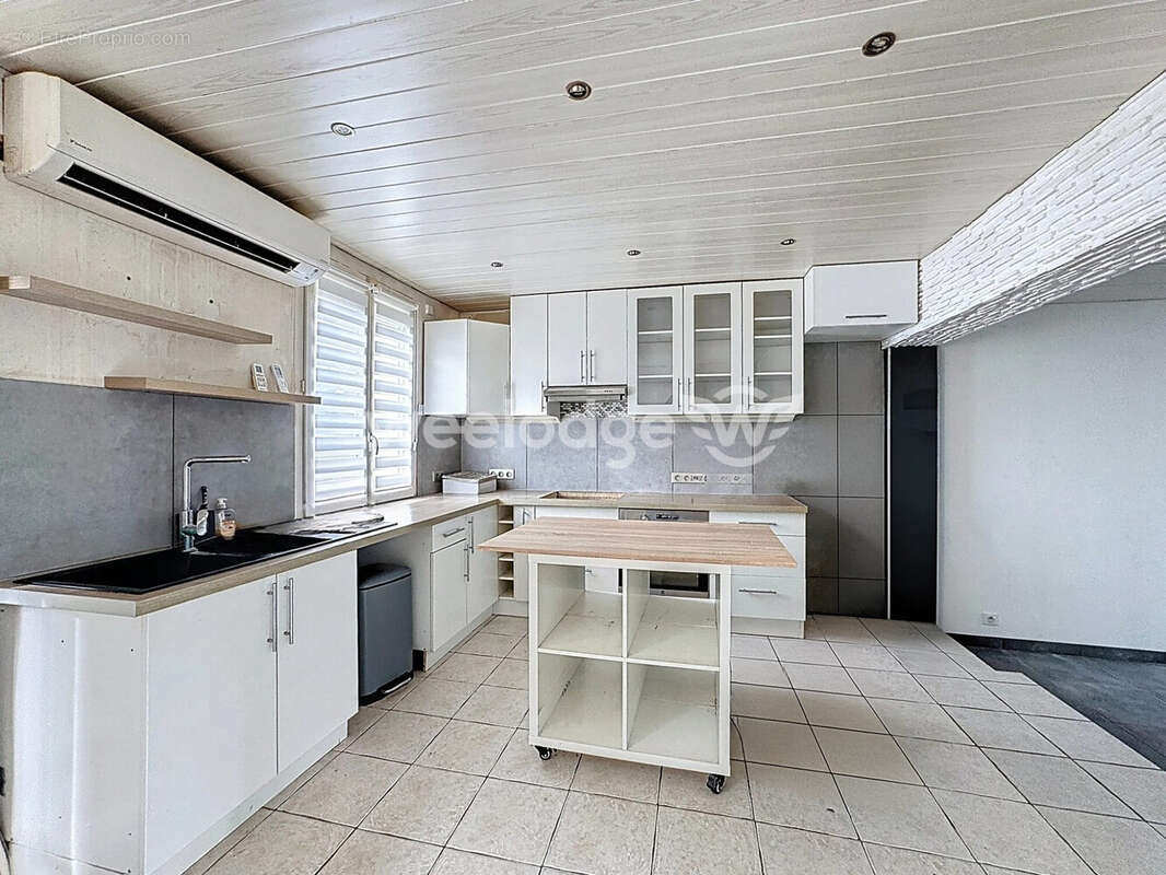 Maison à CHANTELOUP-LES-VIGNES