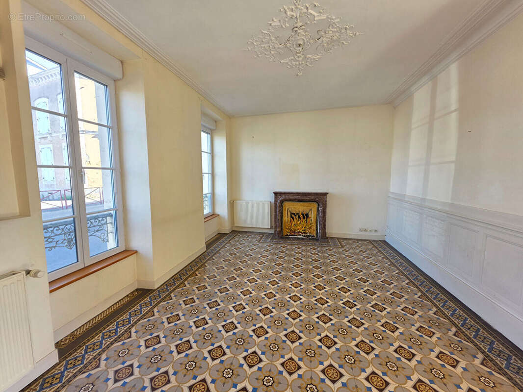 Maison à FRESNAY-SUR-SARTHE