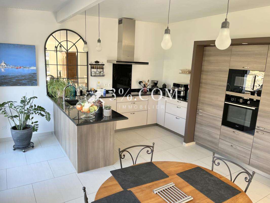 Maison à BOUGUENAIS