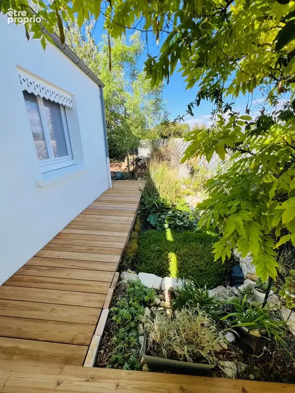 Maison familiale de plain-pied avec jardin, véranda et prestations récentes - photo 4