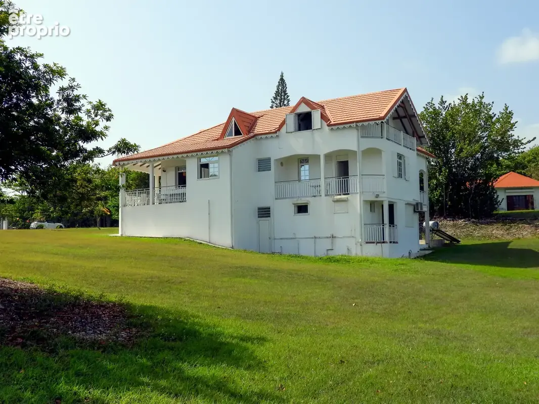 LE MOULE — Maison familiale avec vue mer + appartement T3 indépendant  Terrain de 4 840 m2 constructible - photo 6