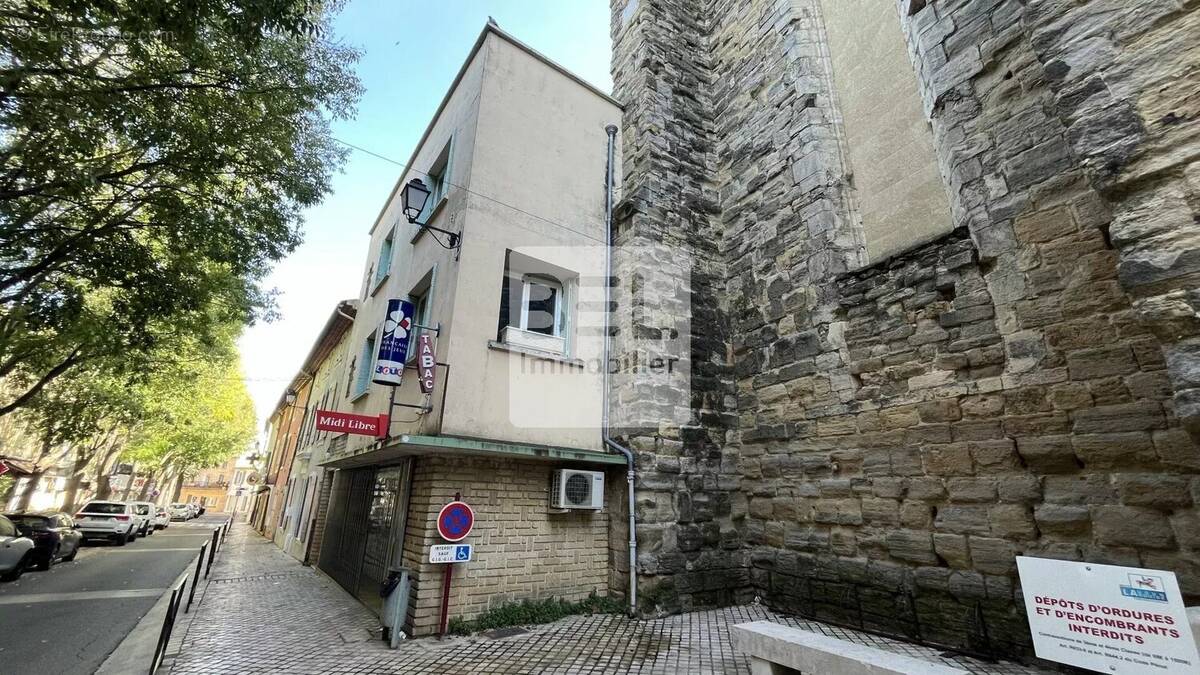 Commerce à LAUDUN-L'ARDOISE