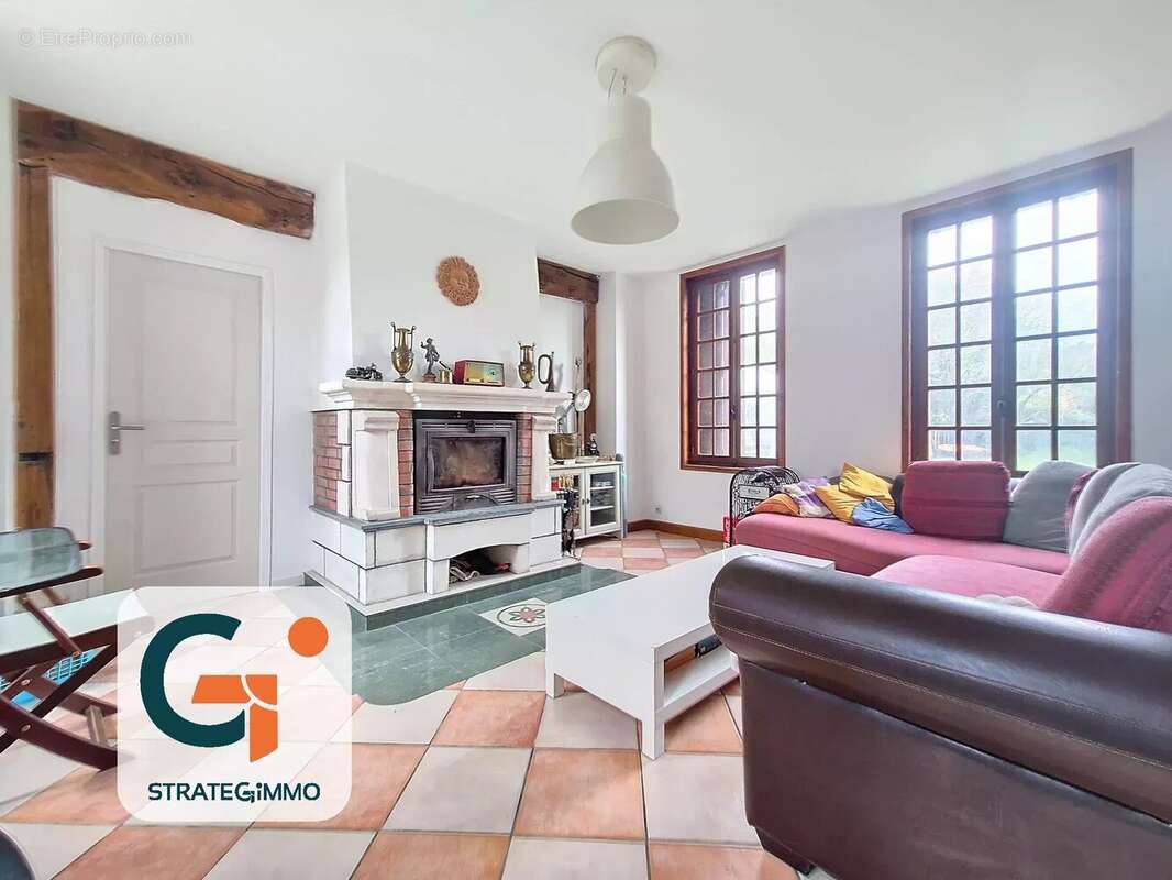 Maison à SAINT-OUEN-DE-THOUBERVILLE