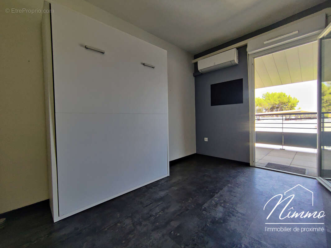 Nimes route duzes appartement t3 dernier etage terrasse garage ascenseur - photo 8