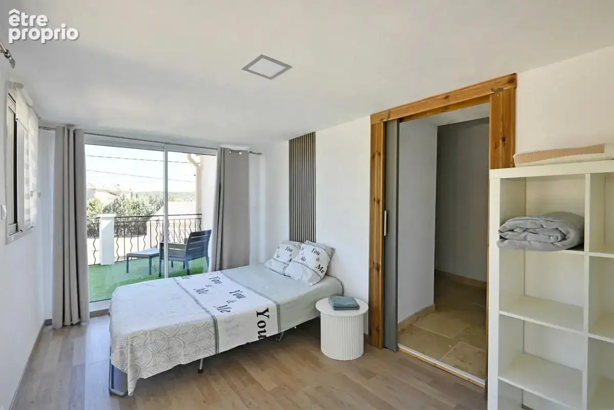 Maison de 5 pièces de 104 m² à Saint-Julien-les-Rosiers - photo 11