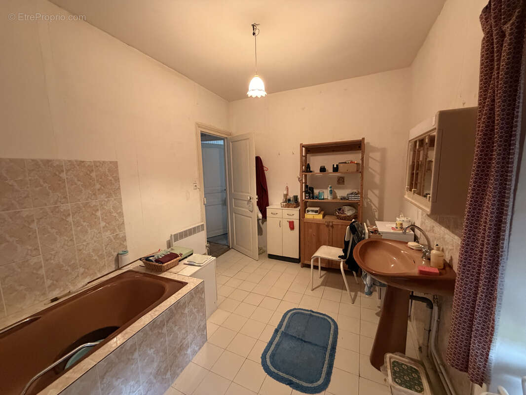 Maison de Bourg à Saint-Sulpice-Laurière - photo 14