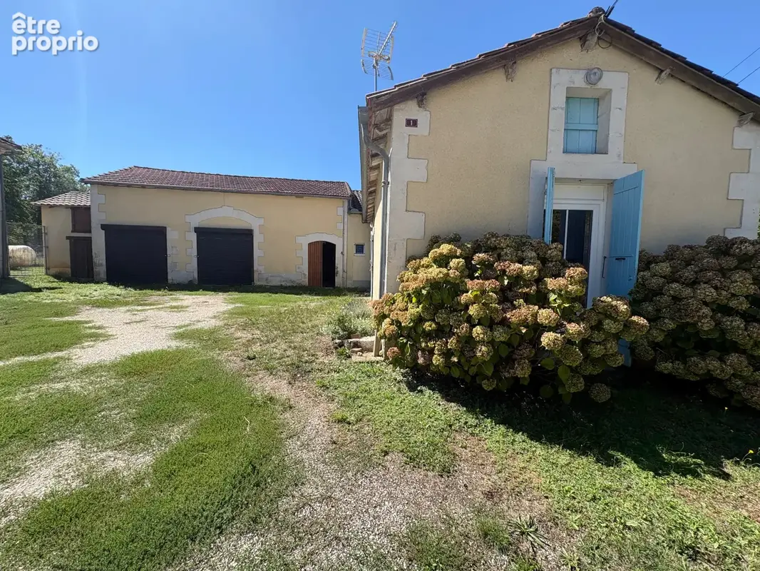 A vendre en Exclusivité : Ensemble immobilier de deux maisons avec grange et garage - photo 6
