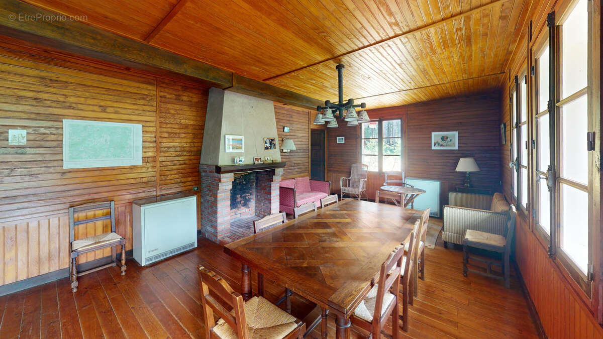 Chalet en bois sur sous sol et terrain attenant boisé - photo 5