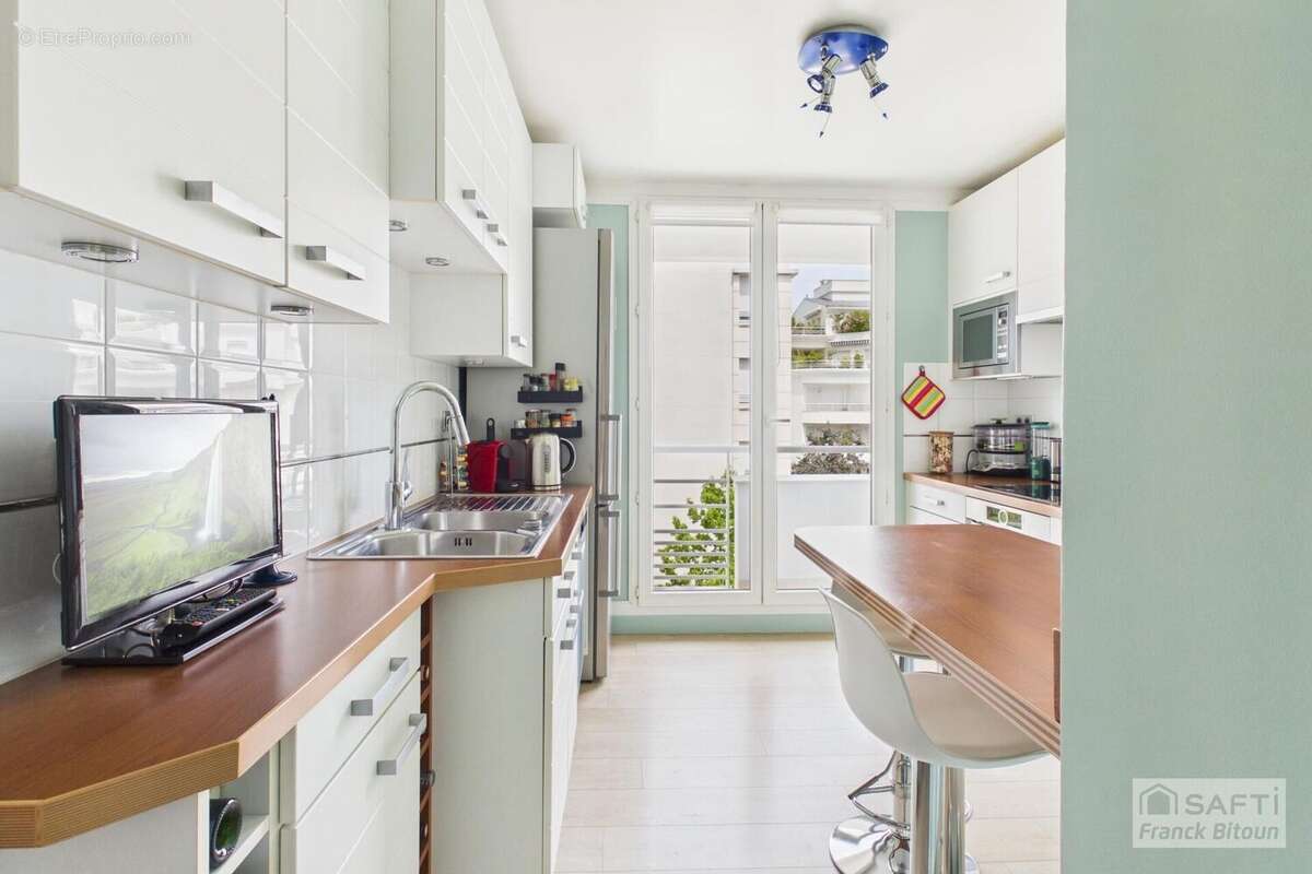 Photo 6 - Appartement à COURBEVOIE