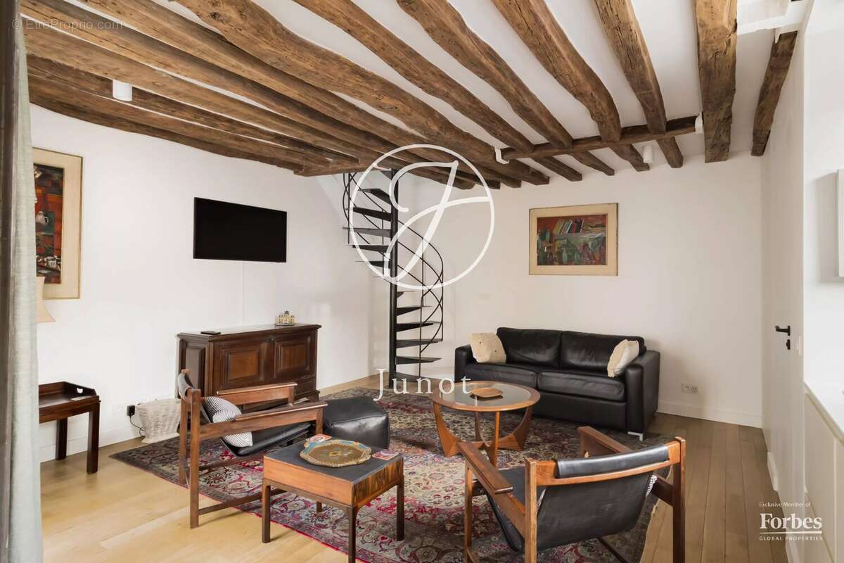 Paris 7e - CARRÉ DES ANTIQUAIRES - Duplex à vendre - 2 pièces - 39,24m² Carrez - 57,53m² au sol - 1 chambre - Dernier étage. - photo 6