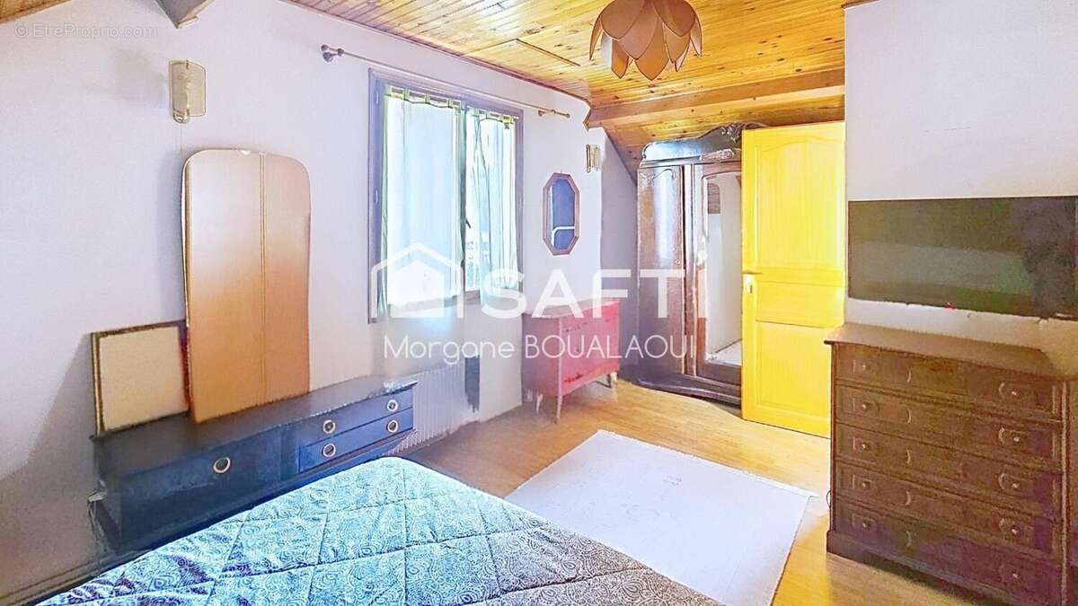 Photo 4 - Maison à GENNEVILLIERS