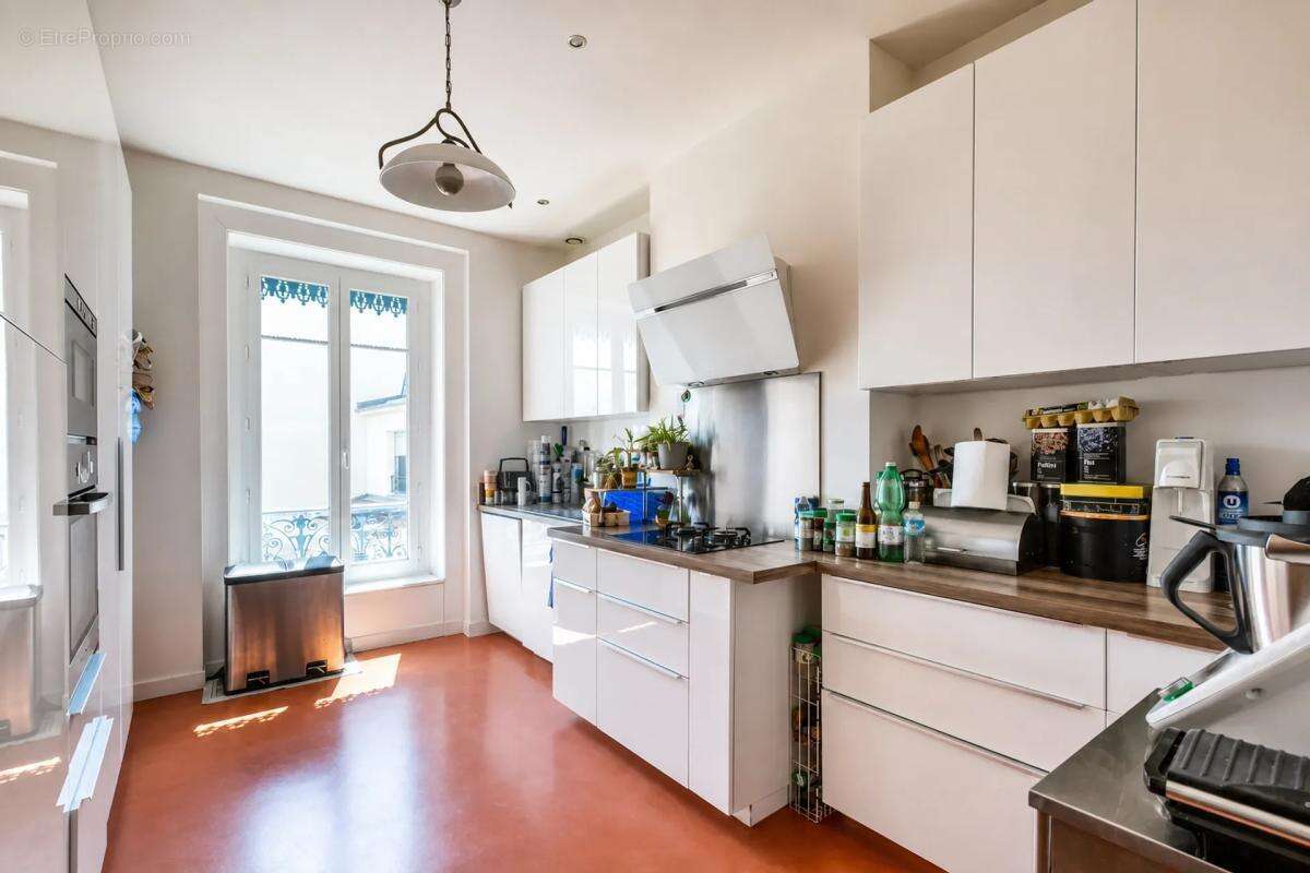 Lyon 7ᵉ – Duplex haussmannien d'exception sur les quais du Rhône – Vue panoramique sur Fourvière - photo 15