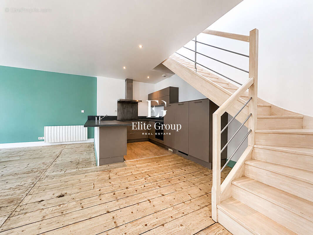 Élégant appartement esprit maison de ville avec terrasse sur les toits - photo 5