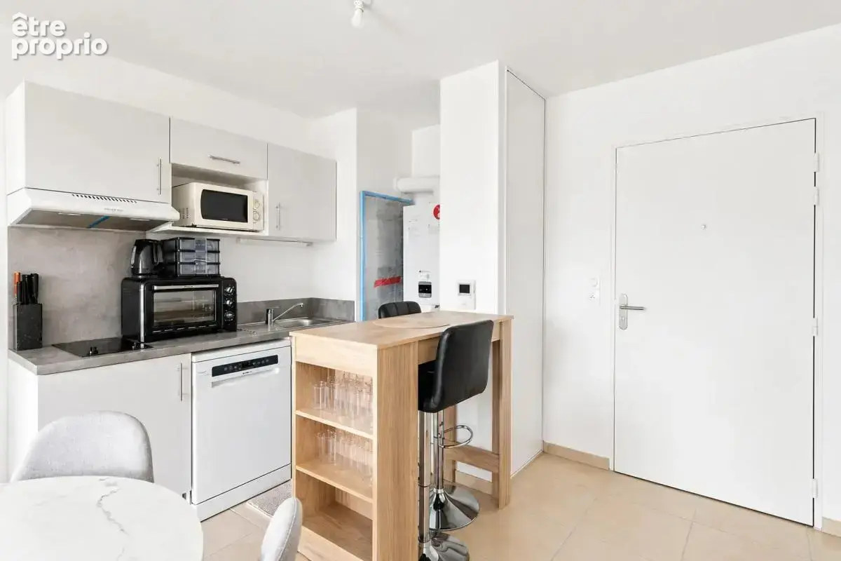 Appartement T2 de 39 m² avec jardin et 2 places de stationnement - photo 7
