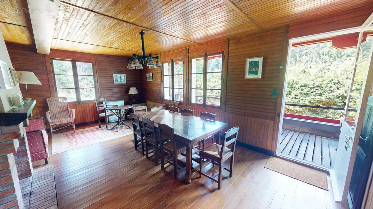 Chalet en bois sur sous sol et terrain attenant boisé - photo 8