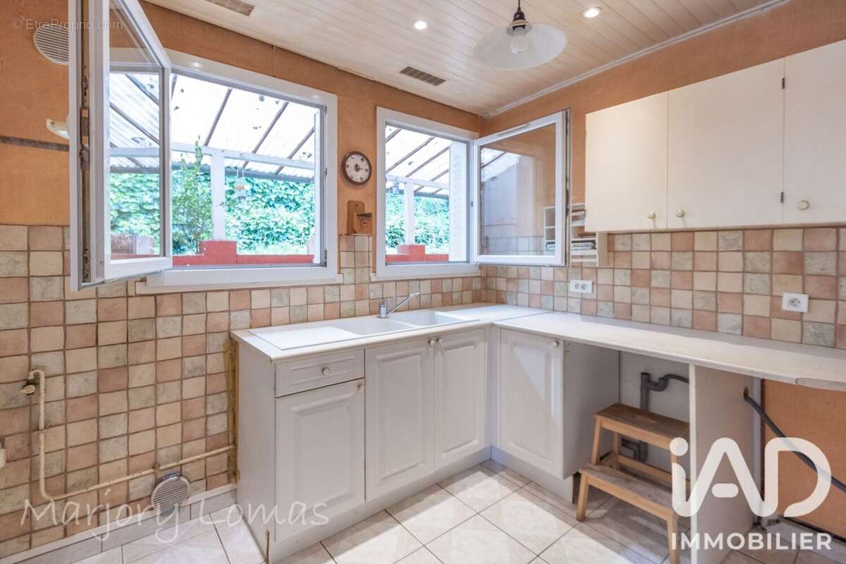 Maison 115 m² à Charbonnieres-Les-Bains  - photo 7