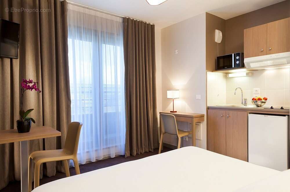 INVESTISSEMENT LOCATIF  ANNEMASSE  Résidence de Tourisme Nehô Suites  Porte de Genève  6,98 % de rentabilité - photo 3