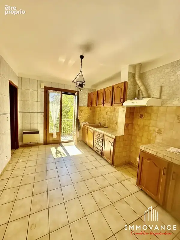 Maison 9 pièces 98 m² à vendre à Beauvoisin (30640) - photo 4