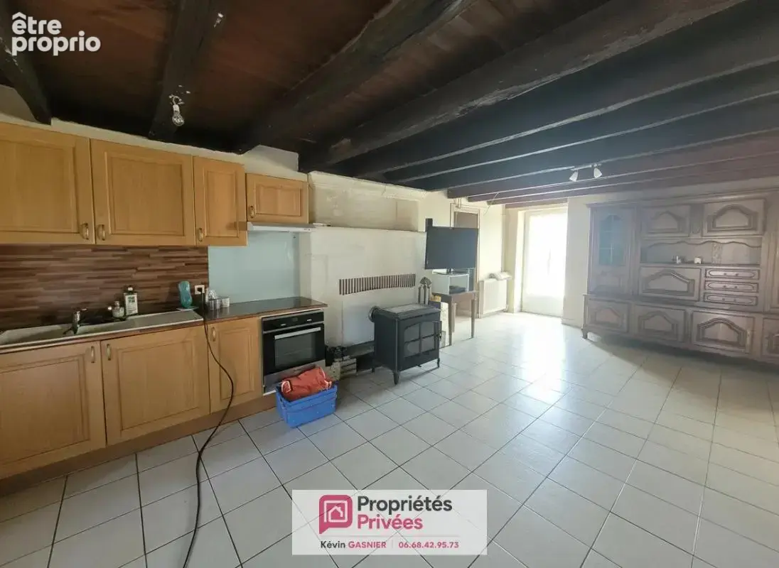 DIGNAC (16410) : Maison en pierre de 76m2 avec grange et atelier - photo 4