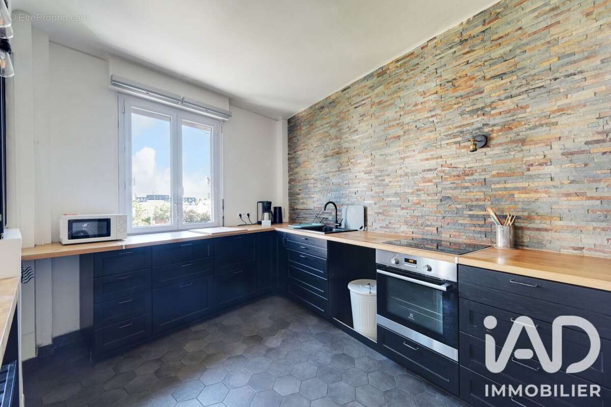 Photo 7 - Appartement à COURBEVOIE