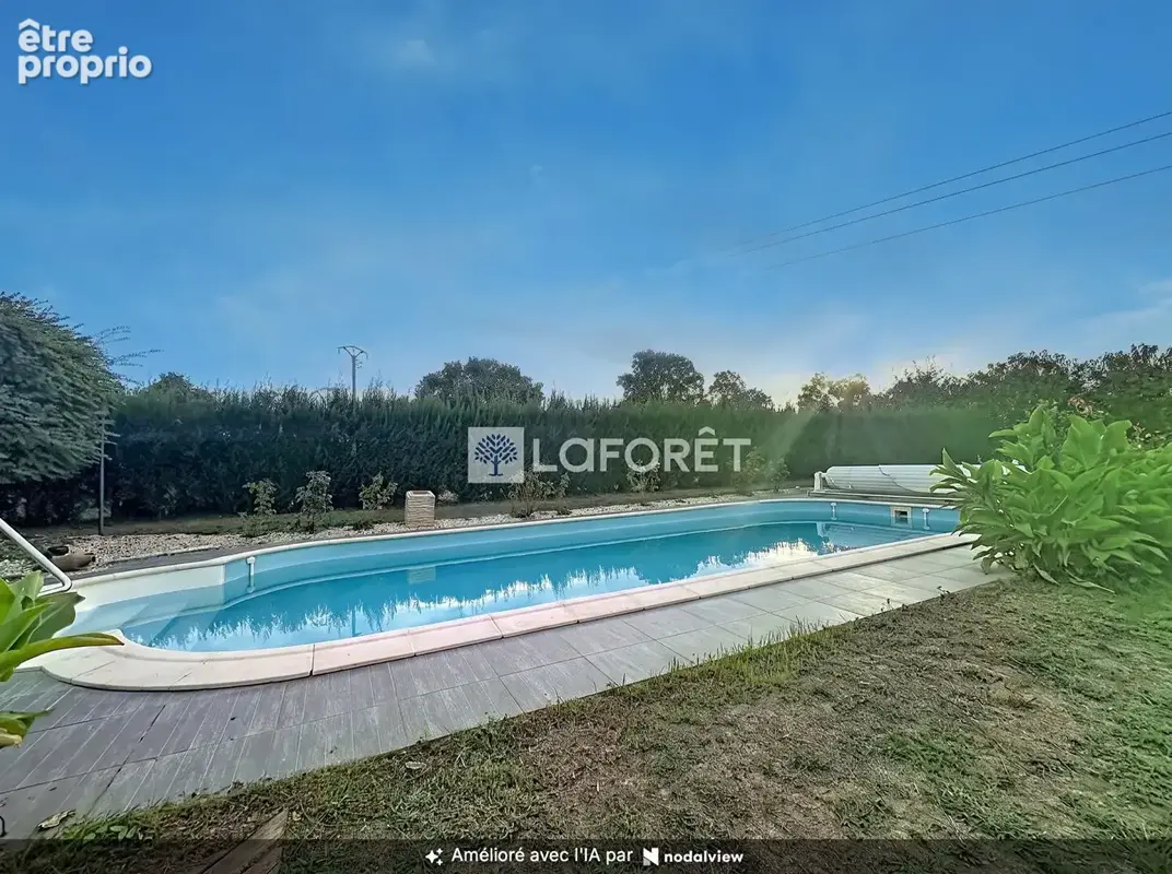 Élégante maison de plain-pied avec piscine chauuffée - photo 4