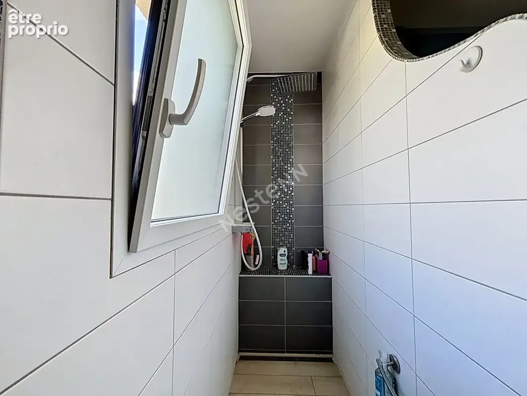 Maison plain pied 7 pièces à vendre à Rezé - La Houssais, 134 m², 3 chambres + mezzanine - photo 12