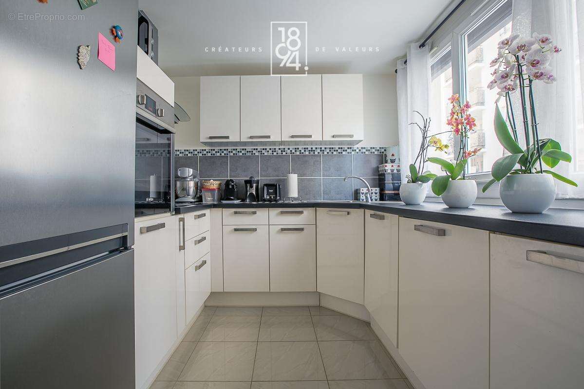 Appartement t3 deux balcons garage en sus parc du 26e - photo 4