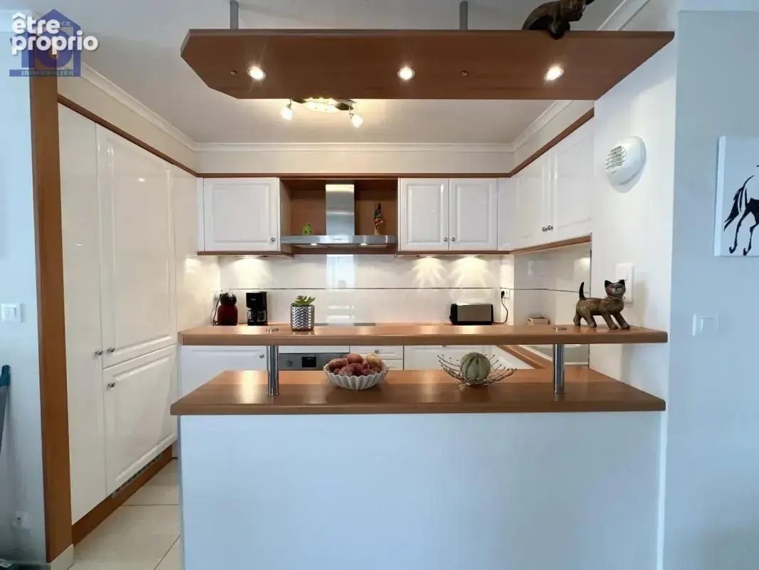 Appartement en rez-de-jardin - photo 4