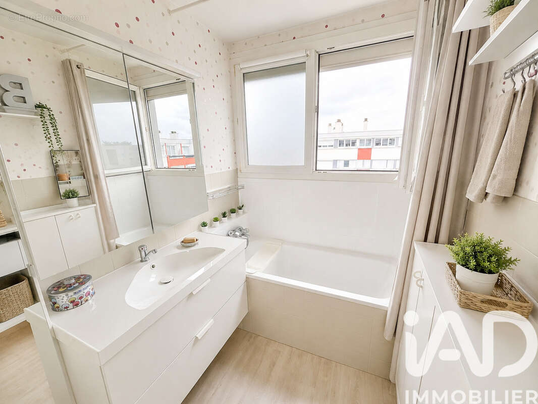 Photo 8 - Appartement à FLEURY-LES-AUBRAIS