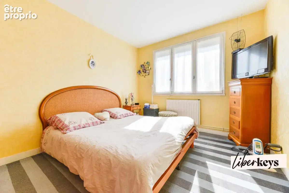 Appartement T4 de 77 m² avec balcon, cave et parking équipé - photo 6