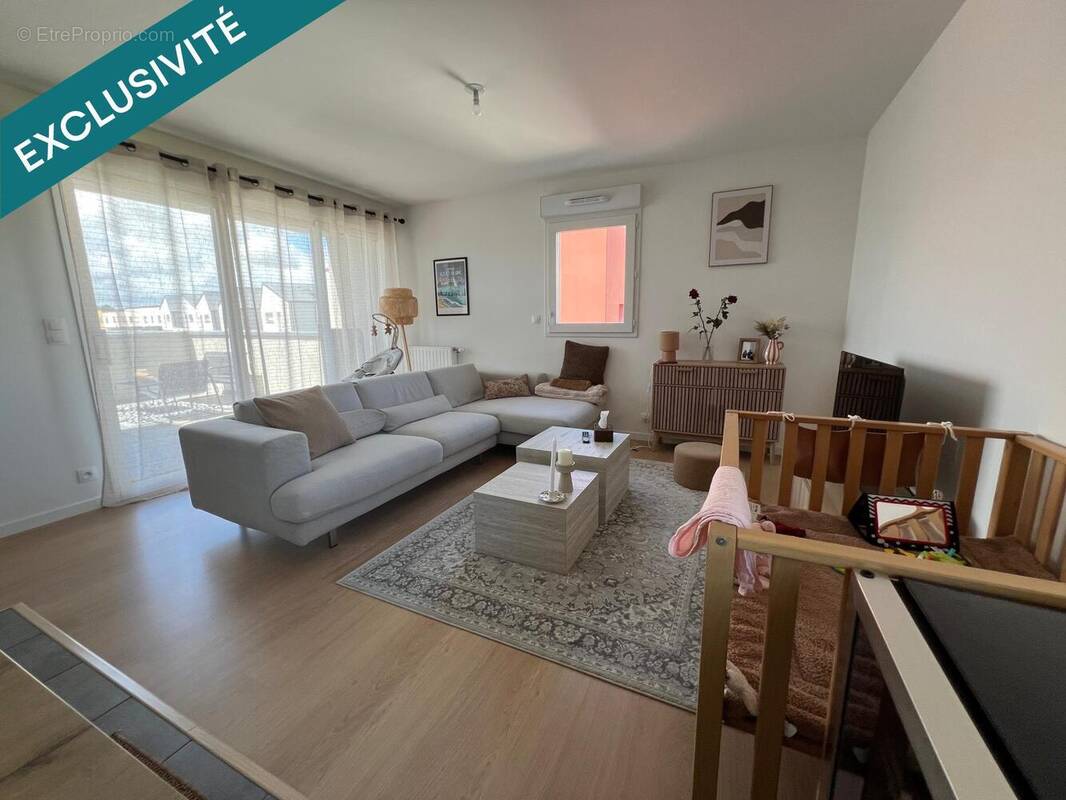 Photo 1 - Appartement à LE RHEU