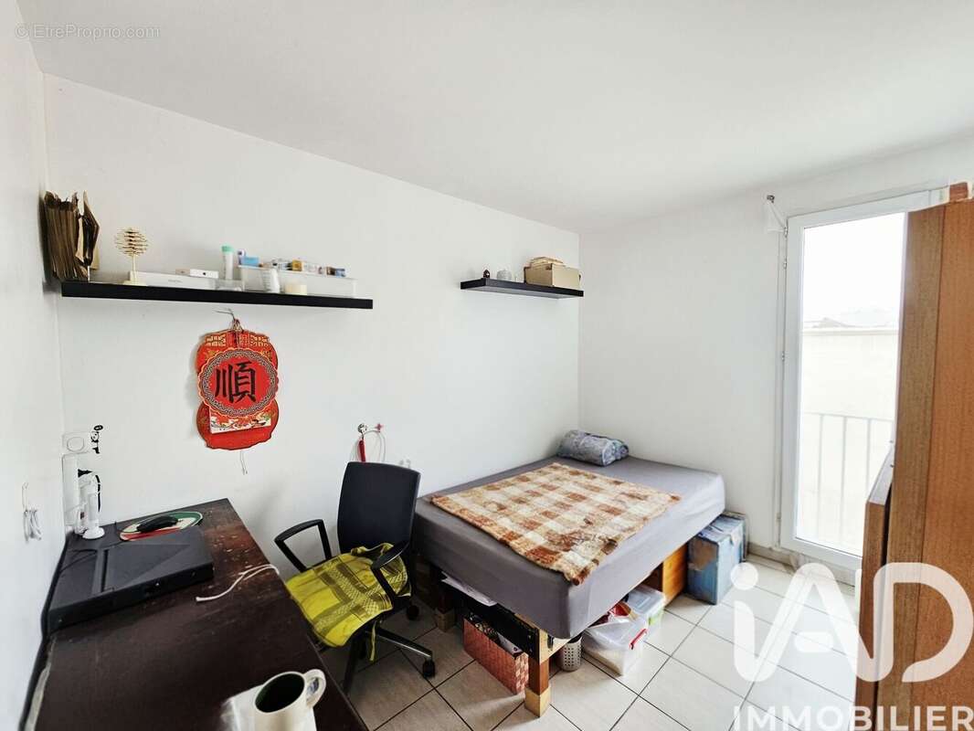 Photo 6 - Appartement à LA COURNEUVE