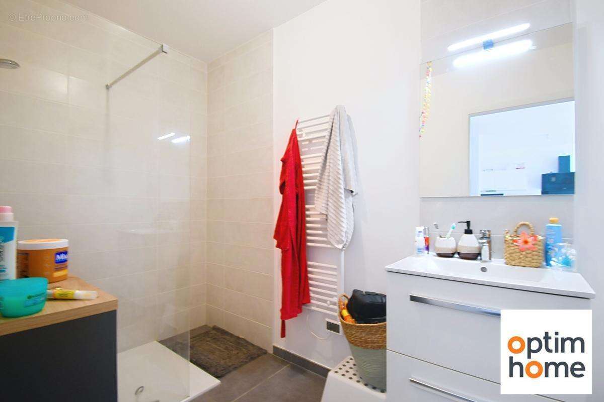 Appartement plain pied 50m2 environ - terrasse - place de parking privative - vendu meuble - photo 6