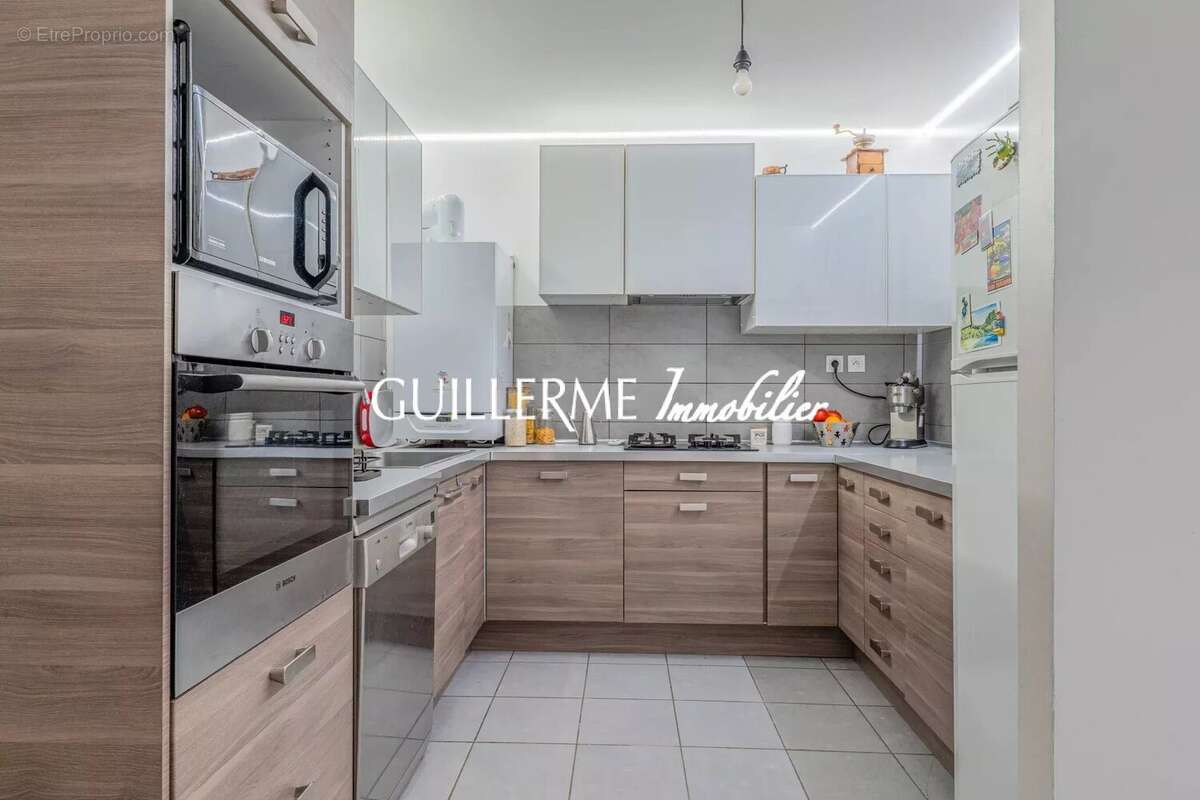 Appartement T4 Genay - photo 6