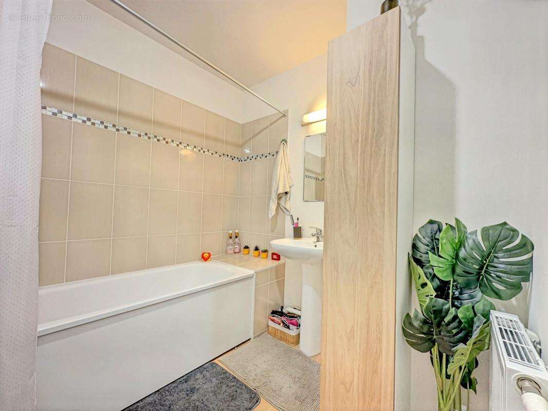 Appartement T2 idéal investisseur, bon DPE, balcon, place de parking exterieur - photo 10