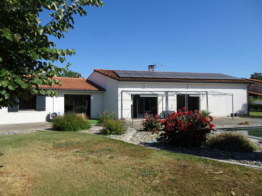 Maison T5 plain pied piscine FONSORBES 31470 - photo 3