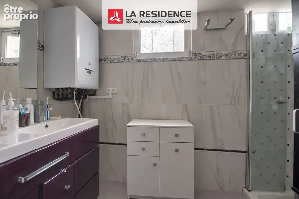 Maison 7 pièces 125 m² à vendre à Saint-Etienne-Du-Rouvray (76800) - photo 9